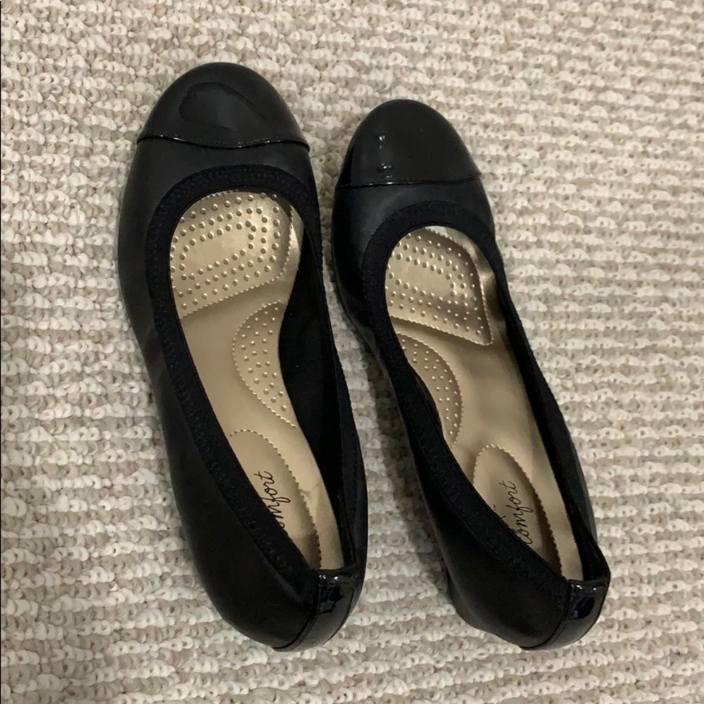 Black flats with tiny lift